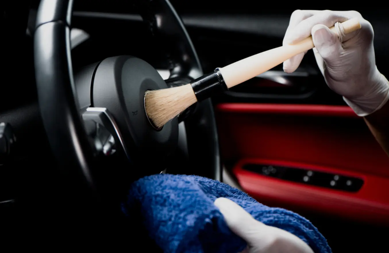Deep interior detailing with brush on steering wheel Phoenix AZ
